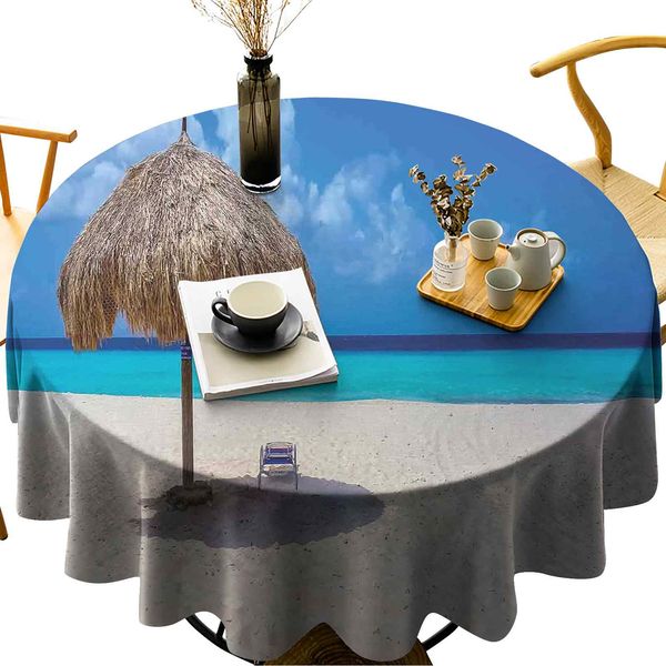

waterproof/oil proof /stain resistant round table cover parasol and chair sunny day in romantic beach caribbean paradise image
