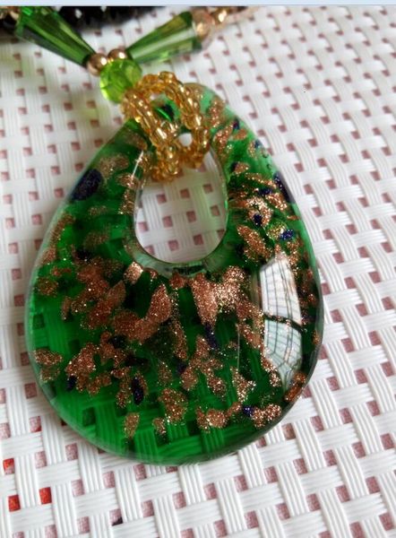 

heart-shaped pendant necklace with d1