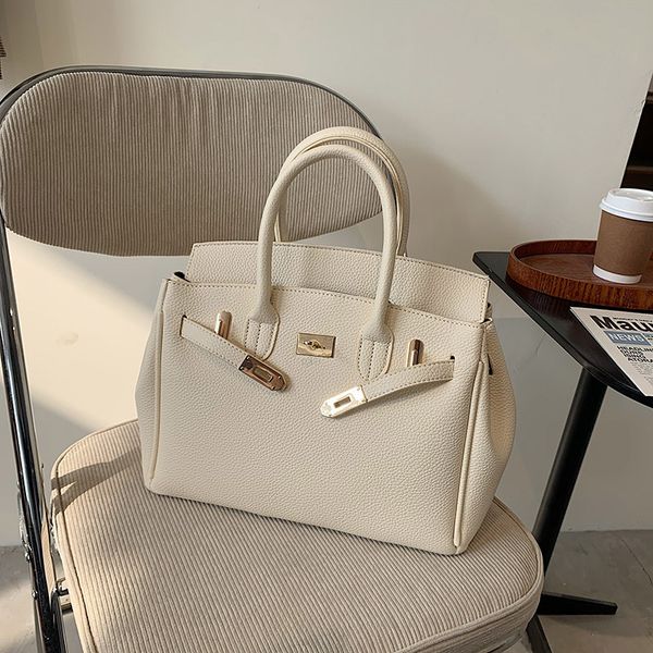 

2020 solds women fashion handbag lychee grain kelly bag large capacity crossbody bag portable shoulder oblique luxurys designers bags