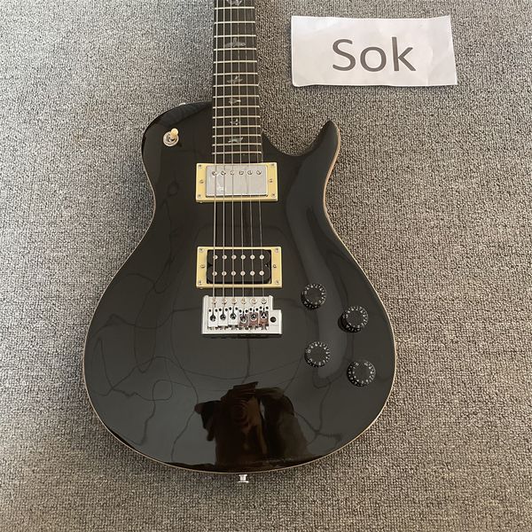 

black electric guitar, rosewood fingerboard, solid mahogany body electric guitar