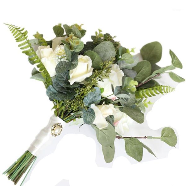 

simple white rose eucalyptus bride holds a flower in her hand to decorate a flower wedding simulation