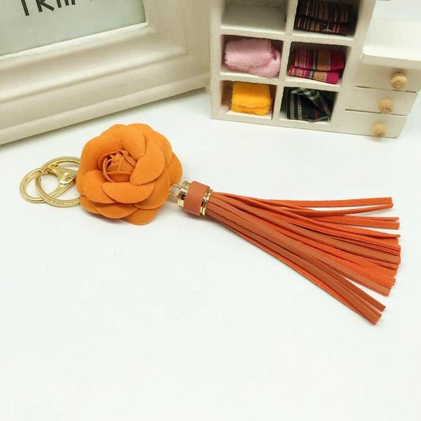 

new arrival camellia flower women leather tassel key chain golden fashion key ring women bag pendant car keychain eh627 h wmtprm