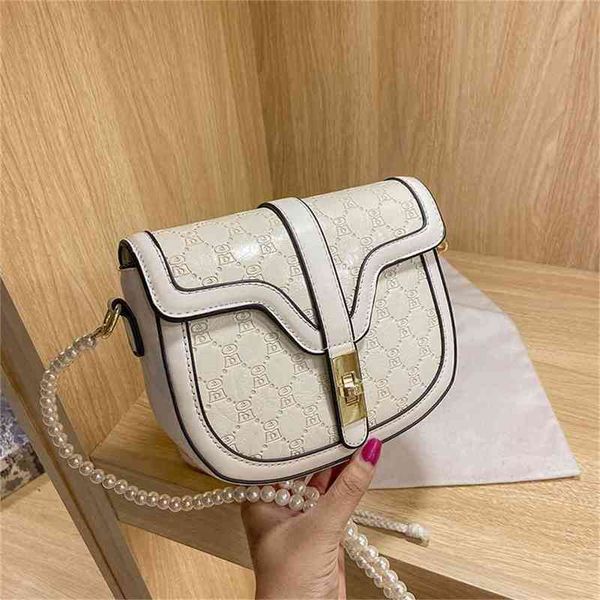 

2022 latest handbag factory store summer popular saddle women's red pearl chain single shoulder