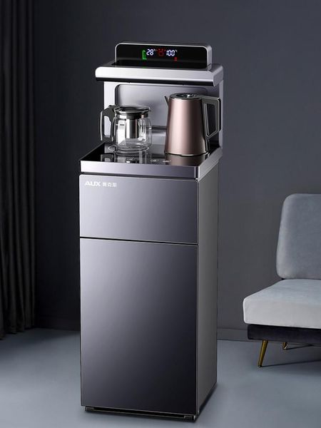 

the new water dispenser home has a lower bucket, automatic intelligent remote control, cooling and heating bar machine