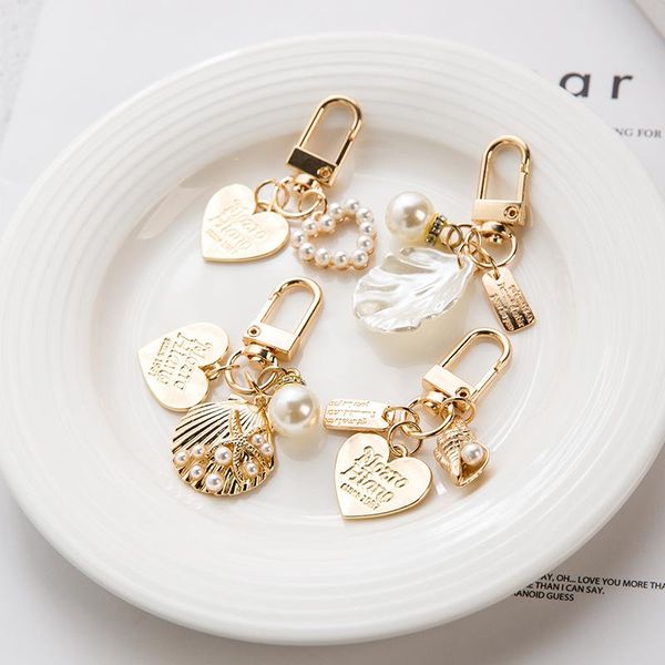 

keychains creative golden cute fairy forest letter peach heart shell protective cover metal car keychain pendant, Silver