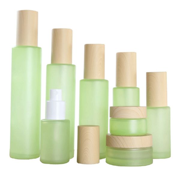 

50pcs/lot 20g 20ml 30ml 40ml 50ml 60ml 80ml 100ml 120ml green frost glass cream jar wooden line cap glass lotion spray bottle