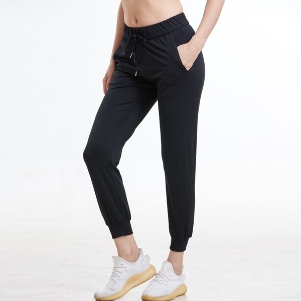 Mulheres Esticamento Tecidos Fit Fit Sport Active Skinny Leggings com dois bolsos laterais Calças de comprimento de tornozelo 201102