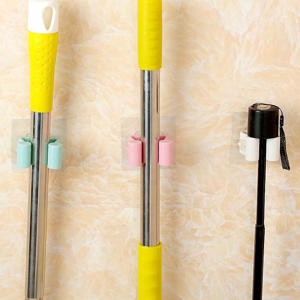 

1pcs creative home furnishing wall mounted mop holder stores daily necessities of daily life tools multi functional seamless mop wmtljo