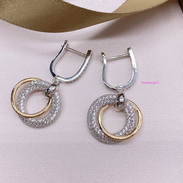 

gold and silver ring red person cold wind zirconium ear ring