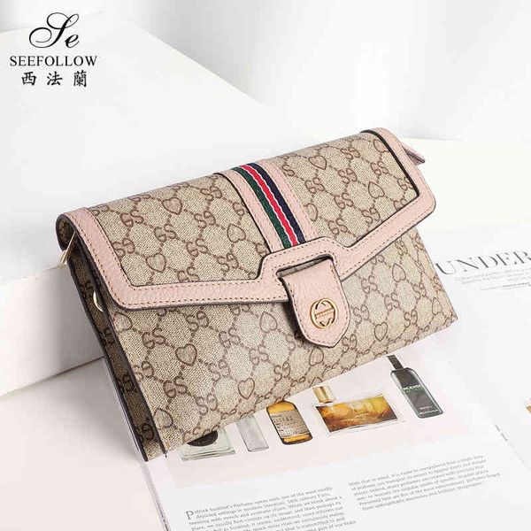 Tasche weibliche neue bedruckte Handtasche große Kapazität vielseitig einfach Mini Sling Schulter diagonal kleine Tasche Geldbörse