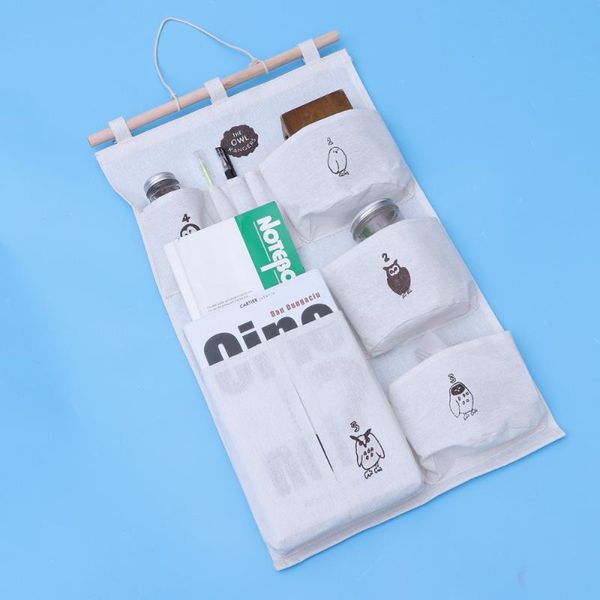

1 pc wall hanging bag household simple multi-pockets storage bag over the door magazine storage pocket bathroom organizer