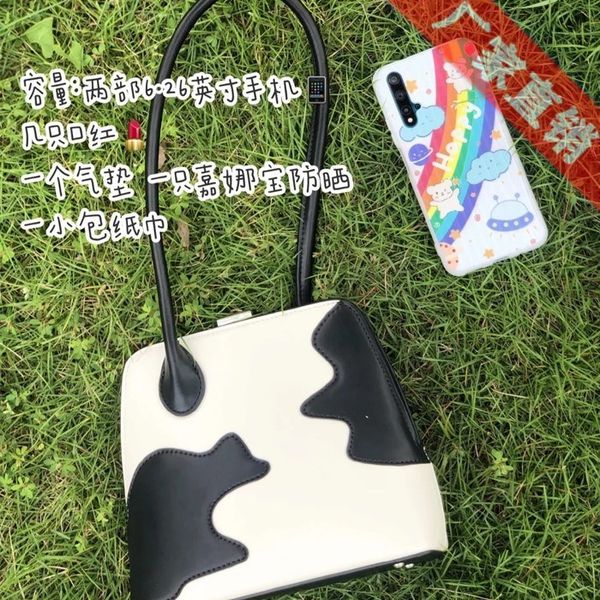 

2020 new small designer women's single shoulder armpit straddle cow clip chain bag shell shape