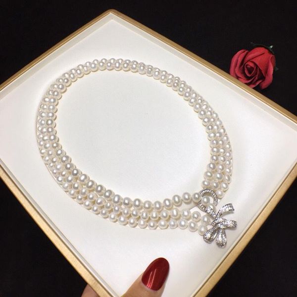 

chokers the multi-layered natural freshwater pearl necklace is about 7-8mm with good skin and quality, Golden;silver