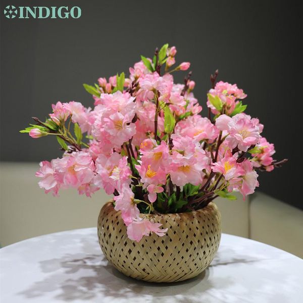 

pink cherry blossom flower arrangement with basket gift table bonsai event spring festival party centerpiece decoration indigo