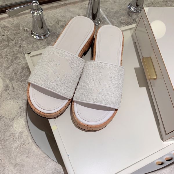 

in spring and summer of 2020, pinpin one word slippers are simple, imported woollen cloth + mesh real leather sole, Black