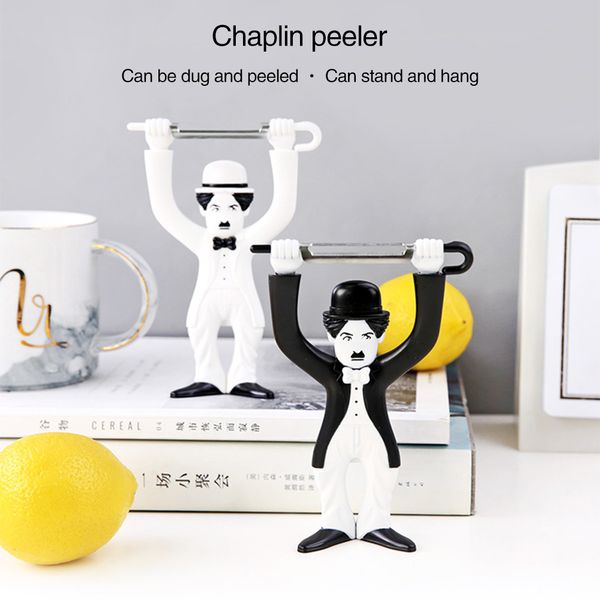 

овощное овощеводство кухня гаджет творческий пластиковый персонаж, стоящий нож для пилинга яблока яблоко