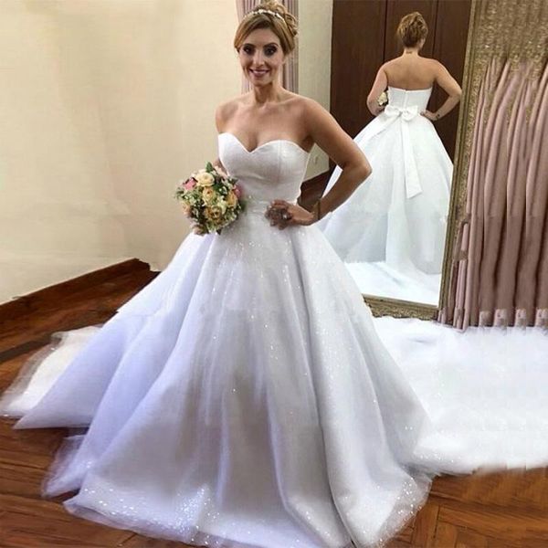 

strapless sequins a line wedding dresses 2021 with bow sweetheart neck cathedral train plus size bridal gowns vestido de novia, White