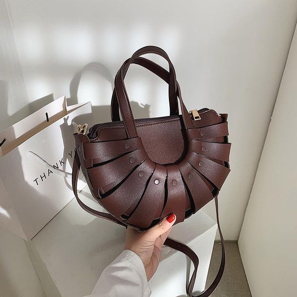 

female personality hollow tote crossbody bag 2021 high-quality pu leather women's designer handbag travel shoulder messenger bag