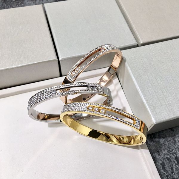 

new 2019 titanium steel fashion ol wind 1/4 white mud full drill titanium steel rose gold buckle three crystal mobile bracelet, Golden;silver