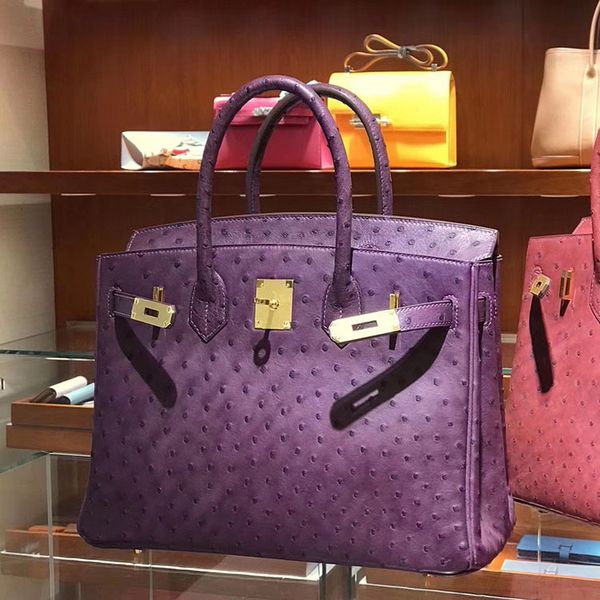 

handmade kelly south africa ostrich skin togo sewn wax line hand bag