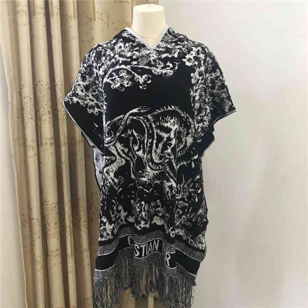 

2022 factory wholesale new d family autumn fashion jacquard animal flower tassel hooded shawl cloak sleeveless sweater women, White;black