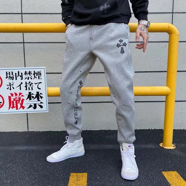 

chao brand autumn and winter ch crosin casual men's leather cross sanskrit embroidered sports pants, Black