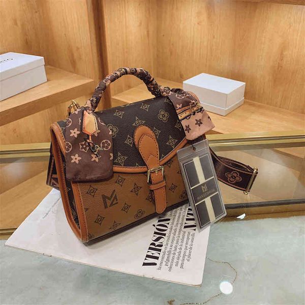 

factory outlet 2022 new fashion messenger net red hand simple ribbon shoulder women's bag