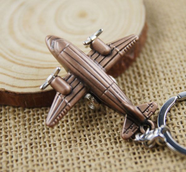 

keyring 100pcs/lot mini 3d airplane keychain aircraft pendant keyfob small plane key chain 3 colors, Silver