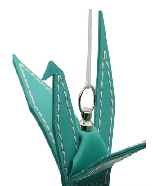 

верхний слой слой коровьей автомобиля кулон цепь цепи овчины творческий бумаги кран безопасности кожаные украшения автомобиля кулон для укра