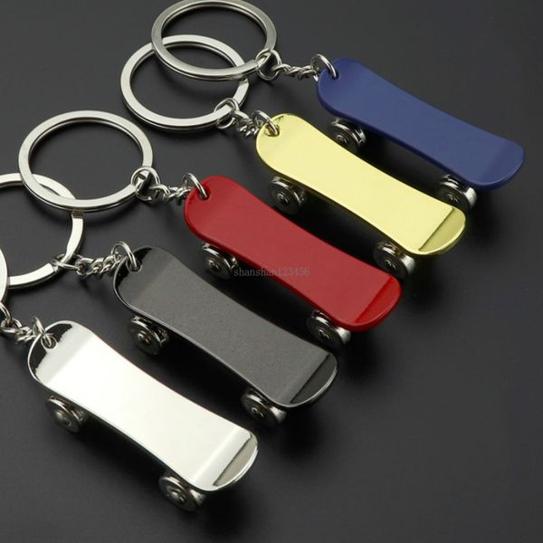 

fashion sport rotatable skateboard keychain key rings holders skateboard bag hangs fashion jewelry for women mens gift will and sandy new, Slivery;golden