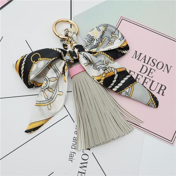 

1pcs bowknot ribbon spring coil leather tassel key chain diy making decorative accessories phone bag craft pendant fringe trim h qyltxk