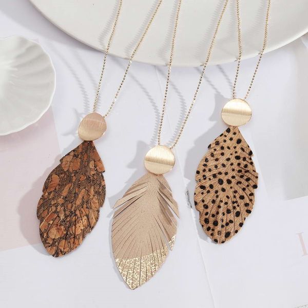 

vintage cheetah leopard leather feather pendant necklace with gold metal disc women animal print cork leather leaf long statement necklace, Silver