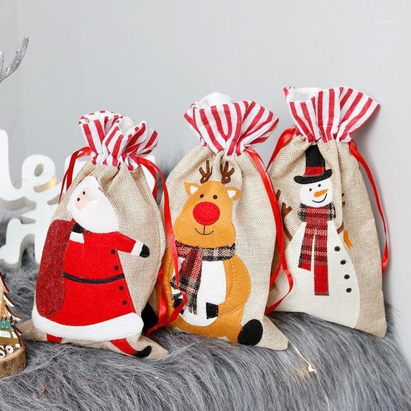 

1p 18*30cm big christmas gift bag santa claus snowman elk drawstring jute burlap gift bags christmas decoration cookie candy bag1