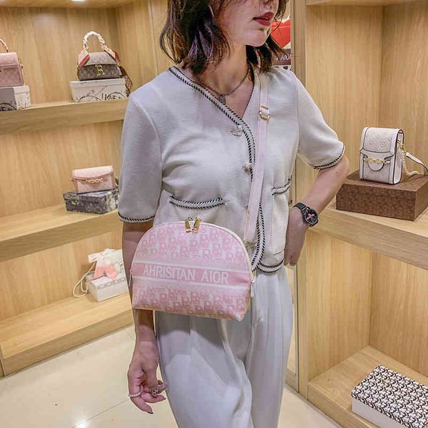 

72% off bag 2022 designer s korean version simple hand-held canvas women's summer new messenger single shoulder fashion saddle