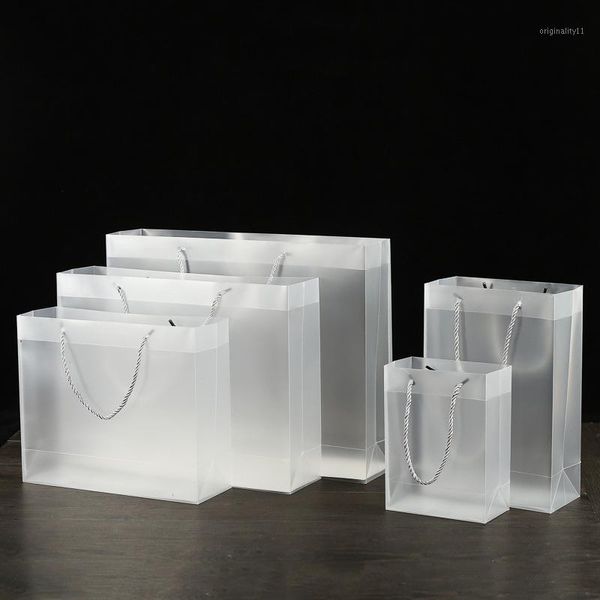 

simple casual pp solid color environmentally friendly transparent tote bag female shopping portable daily gift shopping bag1