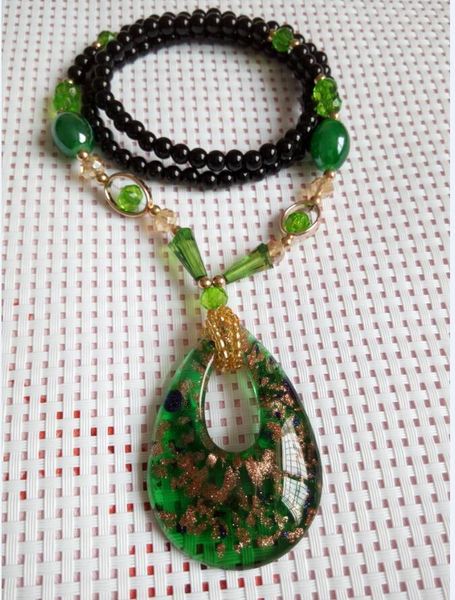 

heart-shaped pendant necklace with a3