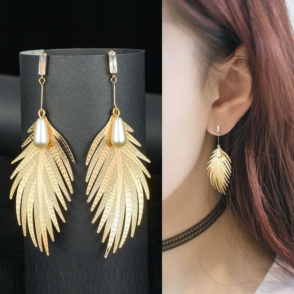 

stud 2021 korean version of the earrings for girls creative environmental protection plating feather shape pearl, Golden;silver
