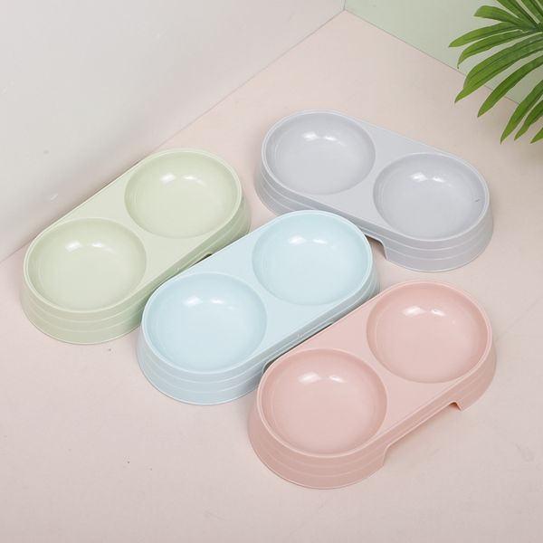 

2020 new candy-colored plastic pet cat bowl fashion ins wind macarons color double oval pet bowl