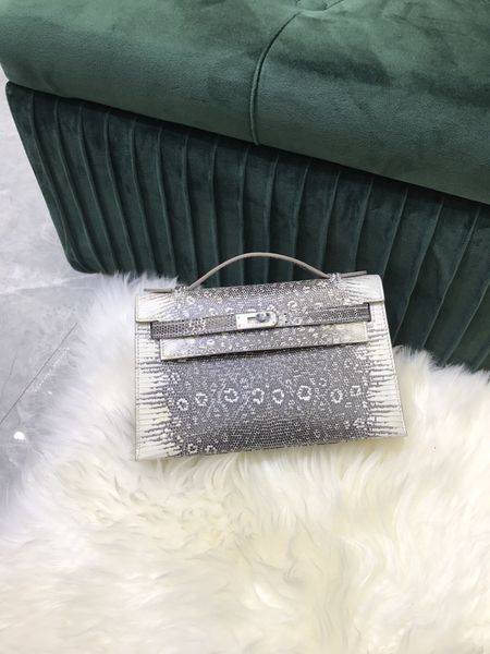 

wholesale price,fully handmadequality,wax stitching,real lizard skin snow color,design mini handbag 22cm,message me for discount and details