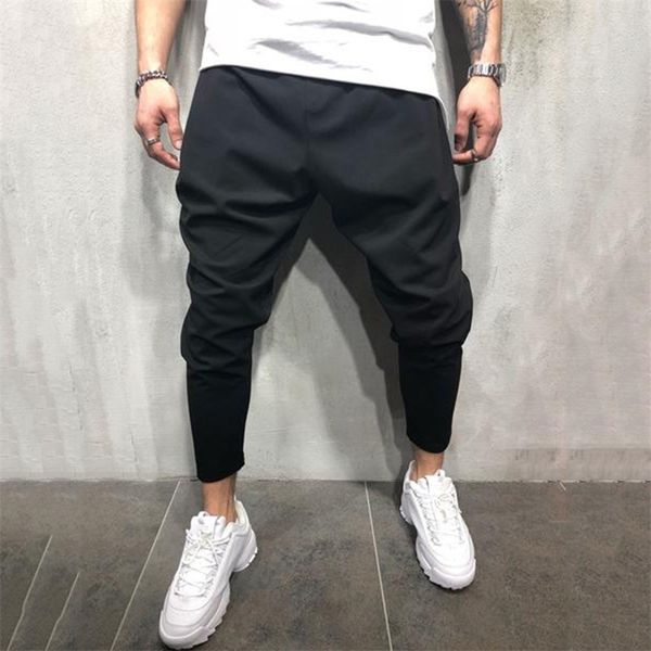 Pantaloni da jogging da uomo Streetwear Pantaloni hip-hop Pantaloni casual da harem Maschile Allentato Slim Fitness Soft Plain Stretto Apertura gamba Abbigliamento 201114