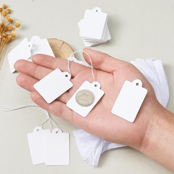 

jewelry display paper price tags white with cotton cord 45x28mm, hole: 2mm; cotton cord: 18cm; 50 bbynpw