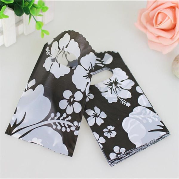 

new design wholesale 50pcs/lot 9*15cm small plastic bag with flower mini jewelry bags1