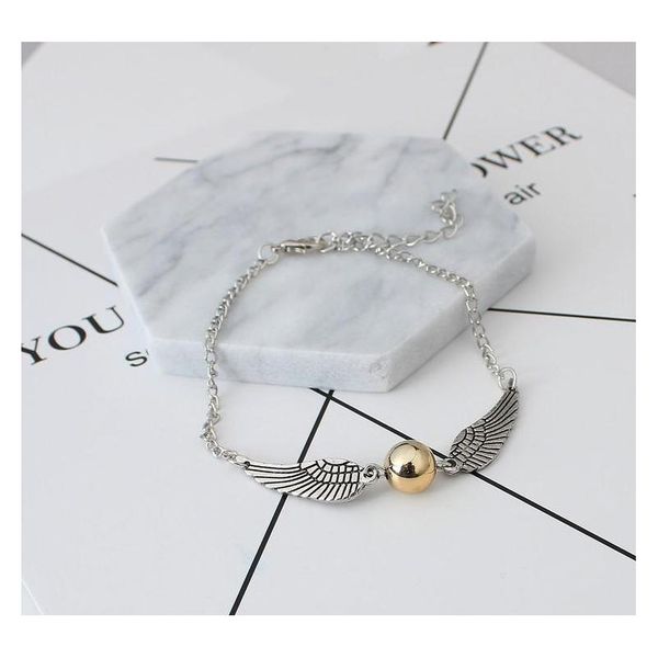 

wing bracelet bronze tone and silver tone the golden snitch bracelets jewelr sqcmmo queen66, Black