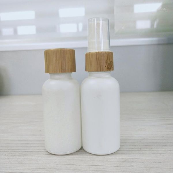

100pc*100ml matte white glass bottle with bamboo spray and bamboo screw lid1