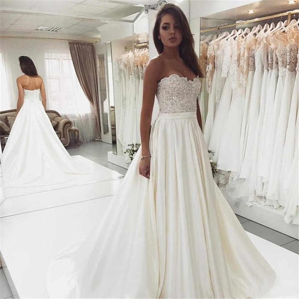 Abiti da sposa senza spalline senza maniche 2021 robe de mariee Applicazioni di perline Cravatta con lacci Abito da sposa Abiti da sposa Abiti da noiva economici