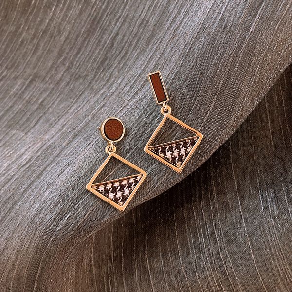 

korean dongdaemun 925 silver needle autumn and winter earrings womens asymmetric swallow gird earrings temperament wild trendy earrings, Red;brown