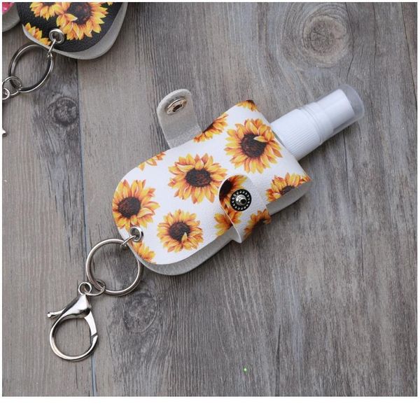 

portable 50ml squeeze spray bottle empty leakproof plastic refillable travel mister bottle with leather keychai qylena