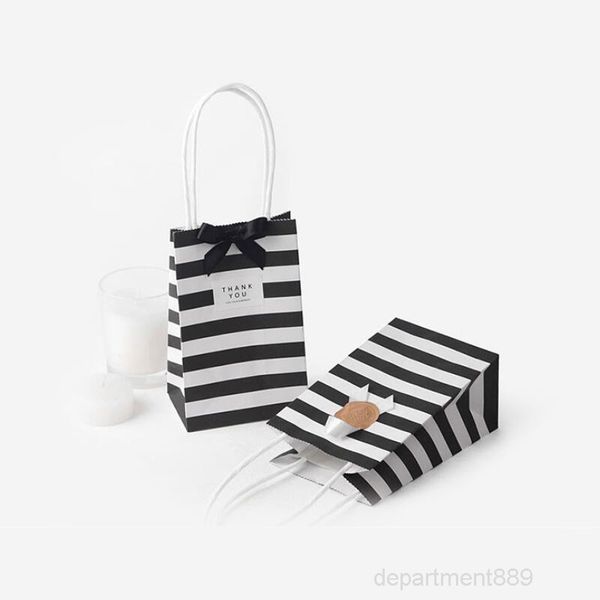 

a-small paper bag with handles bow ribbon stripe handbag cookies candy festival gift packaging bags jewelry birthday wedding owd2922