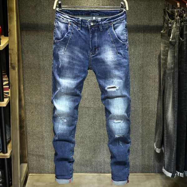 Jeans masculinos 2022 maré de outono marca riscado Rasgado personalidade estilo clássico elegante algodão jovem magro azul