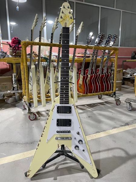 

custom grand relic aged style electric guitar with cream yellow color